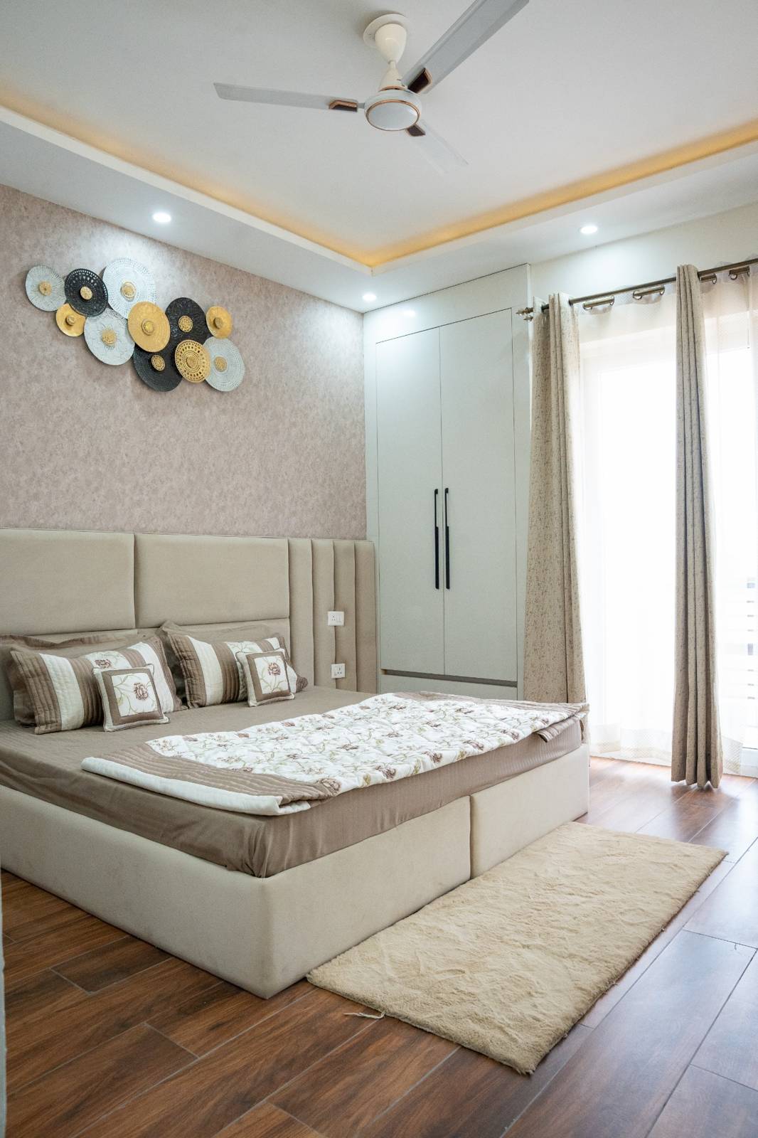 2 BHK primary bedroom with balcony light